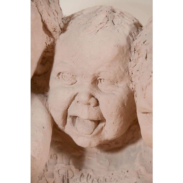 19th century Italian terracotta bust of babies, signed "Pellegrini."