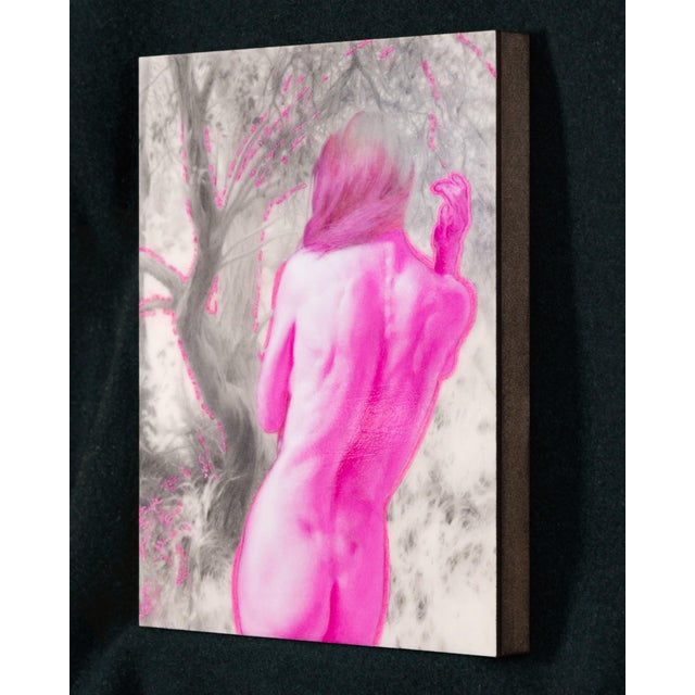 The artwork presents a figure in a striking pose, rendered in a blend of graphite and vibrant pink acrylic, which creates...