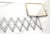 MCM men's chrome magnifying accordion shaving mirror. Accordion opens from 5.5" to a 30" reach.
