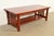 An exceptional Mission or Arts & Crafts style two-tier spindle coffee table By L. & J.G. Stickley USA, 2007 Measures: 48"W...