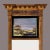 Antique federal era giltwood eglomise mirror. Reverse painted glass depicts a shoreline landscape scene. Original foxed...