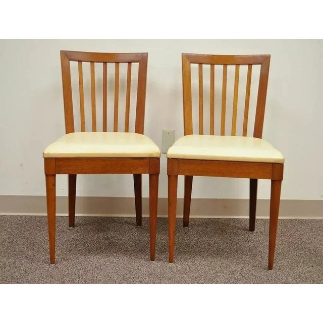 Vintage Paul McCobb Style Mid Century Modern Maple Slat Back Dining Chair - Pair. Item features sleek modernist lines,...