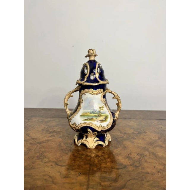 Stunning quality antique Samuel Alcock pot pourri vase and cover, having a blue ground with gold gilding throughout, a...