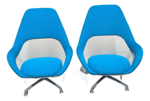 2 Steelcase Coalesse Sw_1 Lounge Chairs Featuring a Striking Bright Blue Upholstery and a Sleek Aluminum Swivel Base.