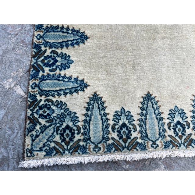 This exquisite vintage runner rug, hand-knotted features a classic Moroccan tribal design. Measuring 3x18'5 ft, it is...