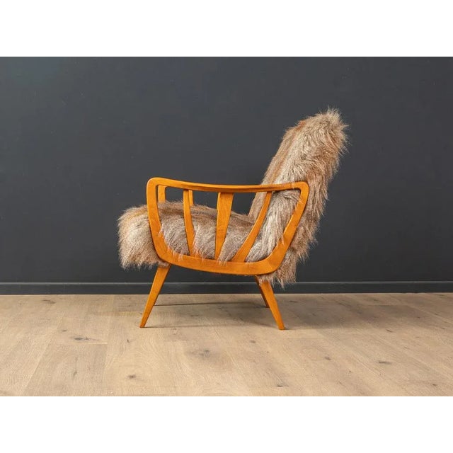 Unique armchair from the 1950s. The original feather core was re -padded and covered with a high -quality upholstery...