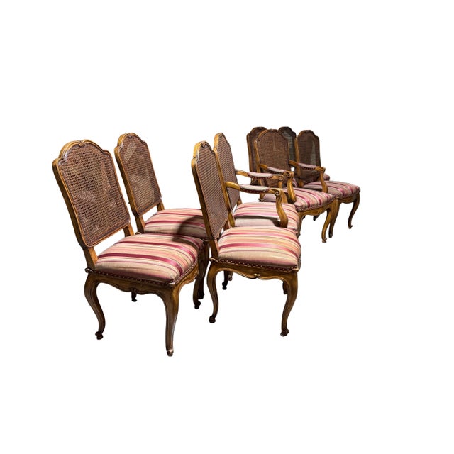 Wonderful set of eight dining chairs from Minton-Spidell dining chairs. Constructed from walnut wood, upholstered seats...