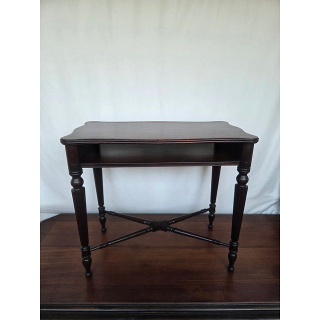 Elevate your space with this refined Lexington mahogany console table, a timeless piece that blends classic Federal...