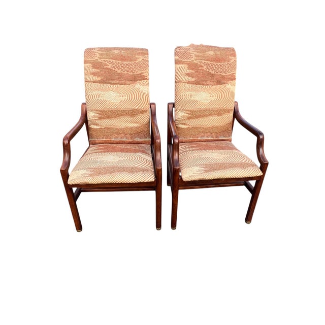 A handsome pair of Henredon Scene One armchairs showcasing the collection’s signature blend of campaign styling and...