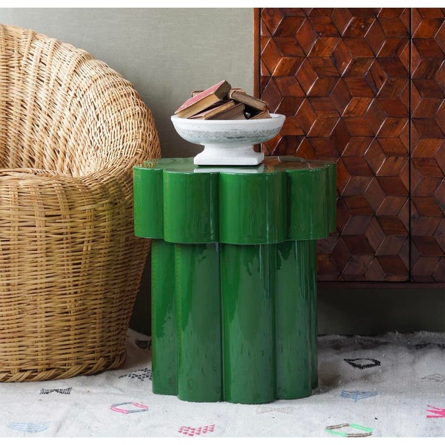 Add a vibrant pop of luck and color with the Emerald Side Table. The flower-shaped, iron tabletop sits atop a thick, inset...