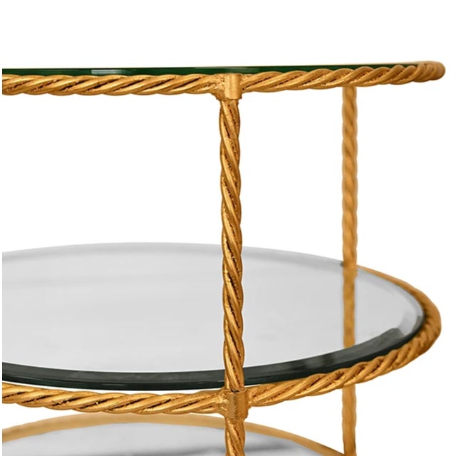 Brand new special order item. Not Vintage. Elevate your space with this striking three-tier occasional table, a perfect...