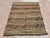 This beautiful, vintage, handwoven kilim rug is approximately 60 years old. It is handmade of wool in all natural colors....