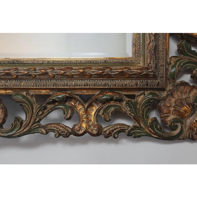 This 1970s Belgian Baroque‑style Rococo mirror captures the theatrical elegance and ornamental exuberance of 18th‑century...