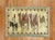 A mid 20th century hand-knotted Turkish Rug with 3 brown camels hooked on a small black horse and a human figure Details...