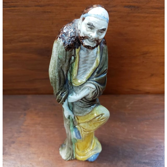 Up for sale is a Circa 1920 Chinese Export Porcelain Taoist Immortal Li Tieguai Figurine, Early Republic Period. It...