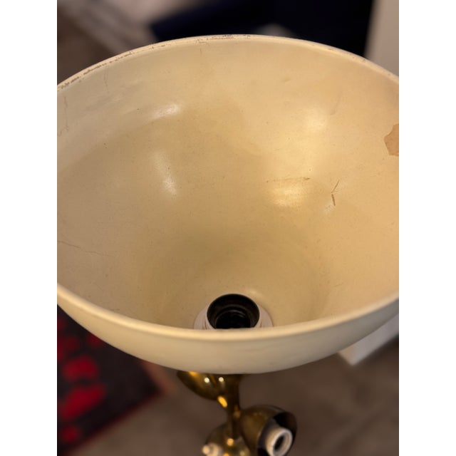 This refined mid-century floor lamp by Bruno Gatta for Stilnovo embodies the clean lines and elegant material contrasts...