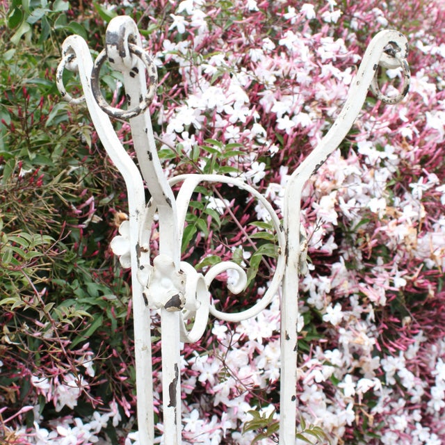 1920's French wrought iron plant stand. We love the soft leaf details'. Substantial in size and impact measuring 55" in...