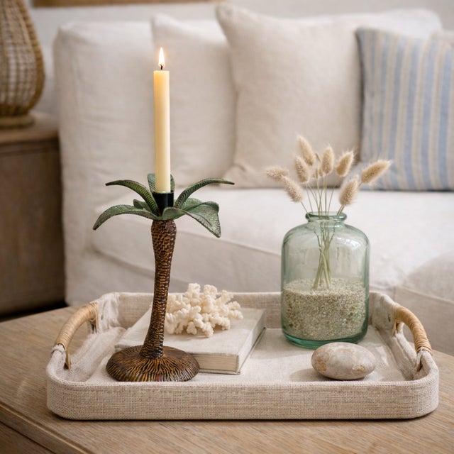 Sculptural vintage palm tree candlestick in the Hollywood Regency style, featuring a finely textured trunk and stylized...