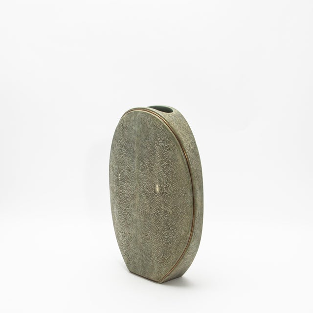 The elegant "Oval Vase" by R&Y Augousti, crafted in shagreen and accented with brass, is a sophisticated fusion of organic...