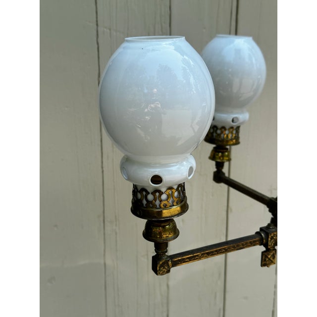 Old Lights On is pleased to offer this. Vintage four arm brass gas fixture with vintage shades. It has been rewired and is...