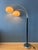 Beautiful dijkstra double arc floor lamp featuring acrylic glass mushroom shades in a warm beige colour, combined with a...