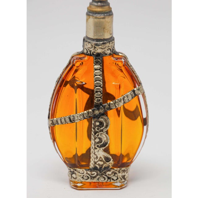 Moroccan Amber Glass Perfume Bottle with Silvered Metal Overlay, Rose Water Sprinkler Elegant vintage Moroccan perfume...