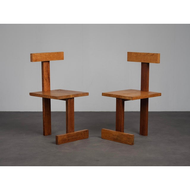 A rare pair of dutch modernist chairs from the 1960s, characterized by their striking geometric construction and...