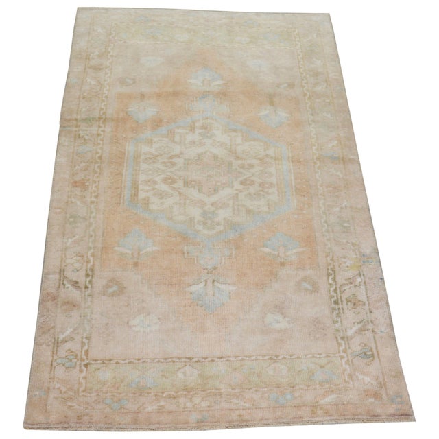 Hand-knotted with care using traditional rug-making techniques, this wool rug blends timeless craftsmanship with a modern...