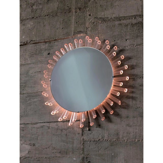 Sun Mirror and Lamp with pink light from the 70s. The rays are made of transparent methacrylate that allow light to pass...