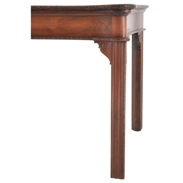 An important antique Irish George III Chippendale mahogany serving table/sideboard, circa 1770. The table made from the...