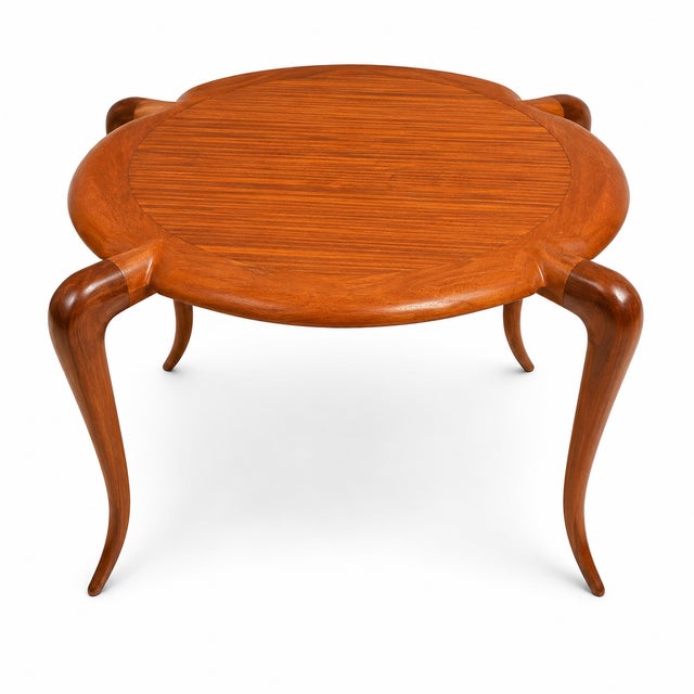 Exceptional sculptural wood occasional table attributed to Alan Goldberg, the distinguished American modernist architect...