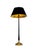 Neoclassical floor lamp in brass and black-lacquered metal. The subtly detailed round brass base rests on three ball-...