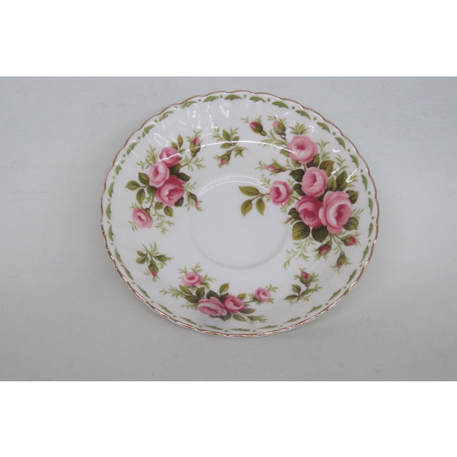 This lovely Floral Patterned Saucer is made of bone china. This beautiful dish is stamped on the bottom as being made by...