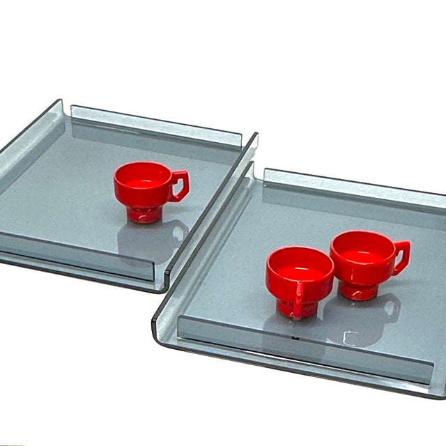 Grey lucite trays. These are stunning oversized mid-century cool-grey transparent thick lucite rectangular trays. Sold...