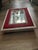 Vintage 1950’s Italian-Styled, Red Velvet trimmed, Silver Analog Shelf Clock that measures about 10 inches wide by about...