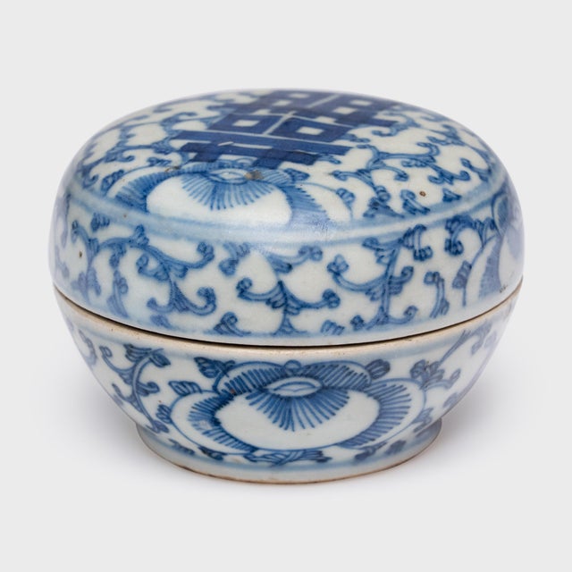 Glazed in the classic, blue-and-white manner, this petite porcelain box offers a blessing of happiness and good fortune....