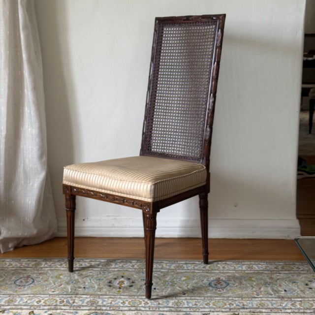 Vintage Neoclassical dining chairs by Karges. Set includes six side chairs and two armchairs. Features carved hardwood...