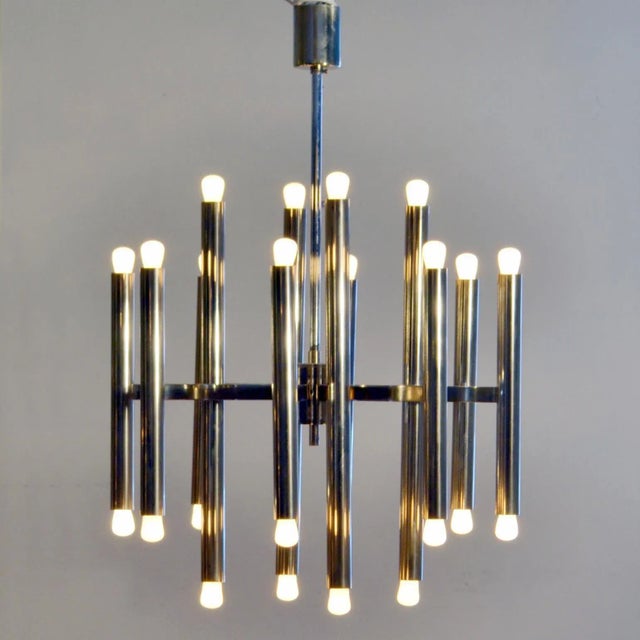 Sputnik up-down lighter chandelier nickel-plated by Sciolary, Italy 1960's carries 24 pygmy or golf bulb lamps. Rewired...