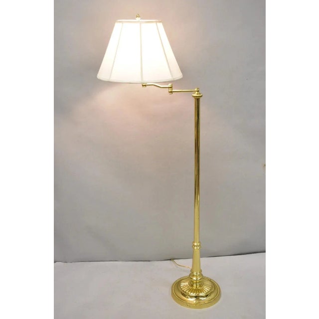 Vintage Traditional Polished Brass Swing Arm Reading Pole Floor Lamp with Shade. Circa Late 20th Century. Measurements:...