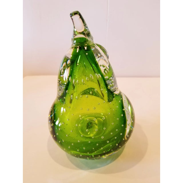 Pretty Green Blown Murano glass pear with controlled bubbles and beautiful green color.