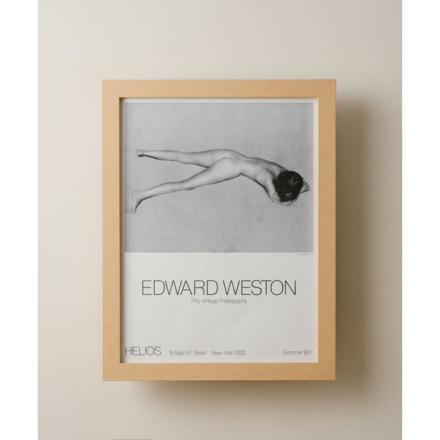 The "Naked in the sand" HELIOS Summer 1977 poster refers to the rare, exhibition poster for the Edward Weston...