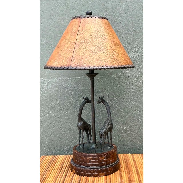 Crafted by Maitland Smith, this Boho-style table lamp pairs a sculptural spirit with fine materials, anchored by a...
