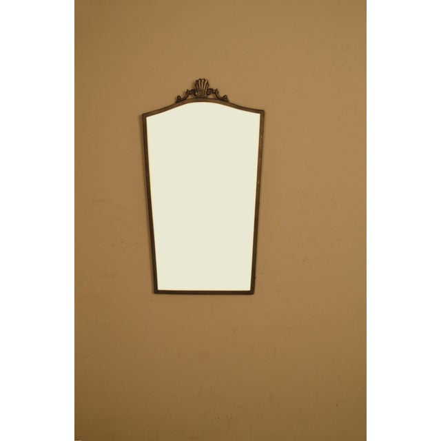 Graceful mirror from Sweden, 1930s Marked with the manufacturer's stamp Svenskt Tenn This piece has an attribution mark, I...