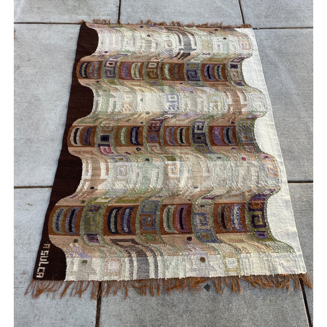 A tapestry signed "A. Sulca" indicates an authentic masterwork by one of the absolute pioneers of modern Peruvian textile...