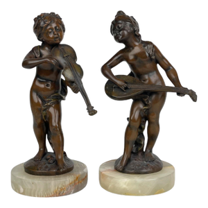 A Pair French of Patented Cherub