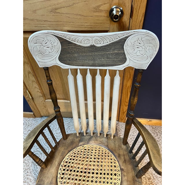 Charming antique American rocking chair from the late Victorian / early 20th century (circa 1890–1910). Features a...