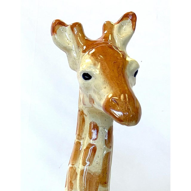 I love this vintage ceramic statue from 1991. The resting giraffe is made of ceramic and hand painted in shades of white,...