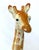 I love this vintage ceramic statue from 1991. The resting giraffe is made of ceramic and hand painted in shades of white,...