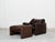 Maralunga armchair by Vico Magistretti. Upholstered in high-quality dark brown leather. The ottoman is slightly lighter. I...