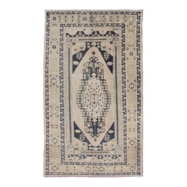 Vintage Turkish Oushak Rug With Ivory Field and Deep Blue Medallion Design For Sale
